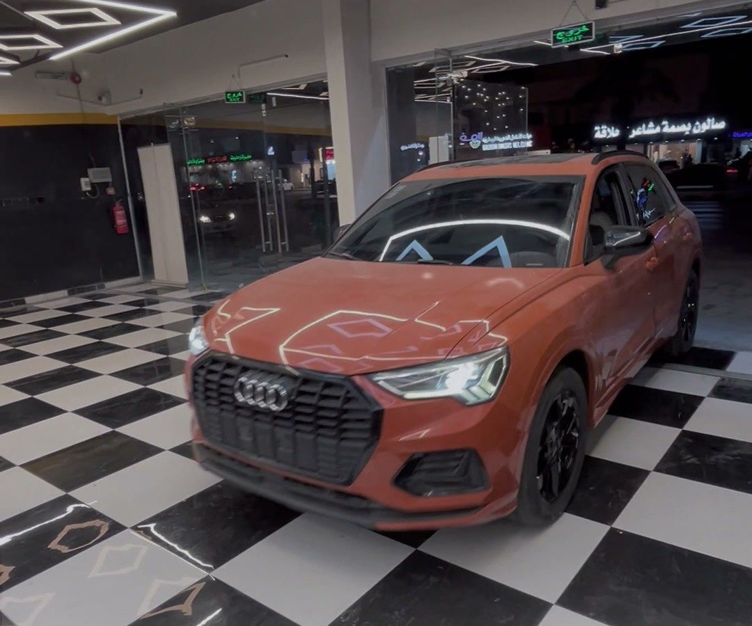 Orange Audi Q3 before matte PPF